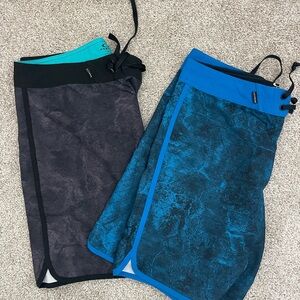 2 Oakley Board Shorts
Oakley Black and Gray & Blue Board Shorts